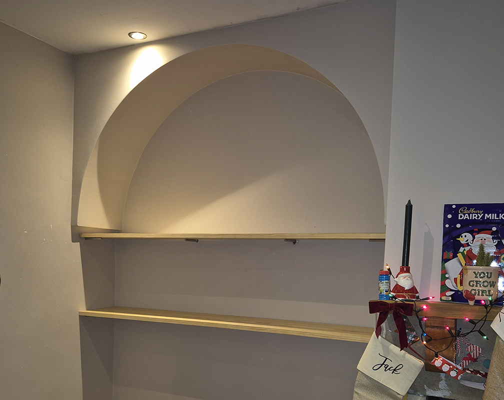 Custom shelving and alcove installation