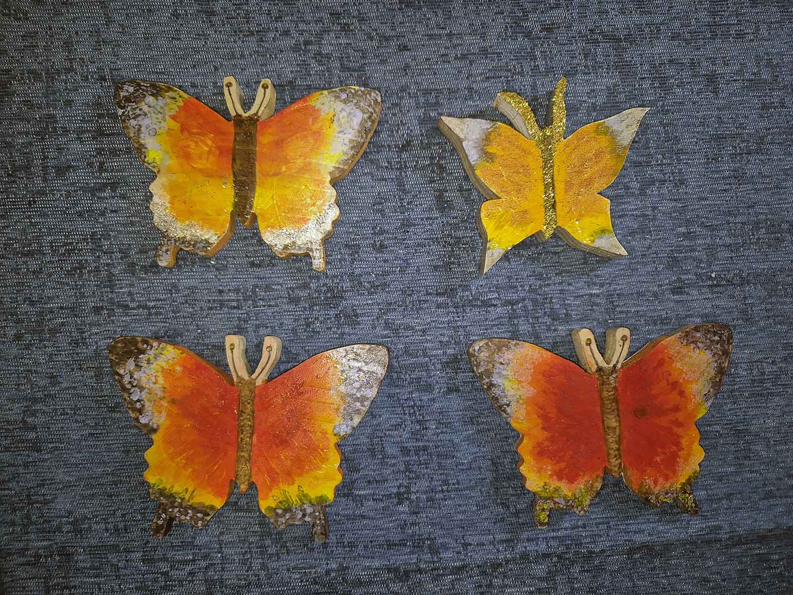 Four hand painted butterflies