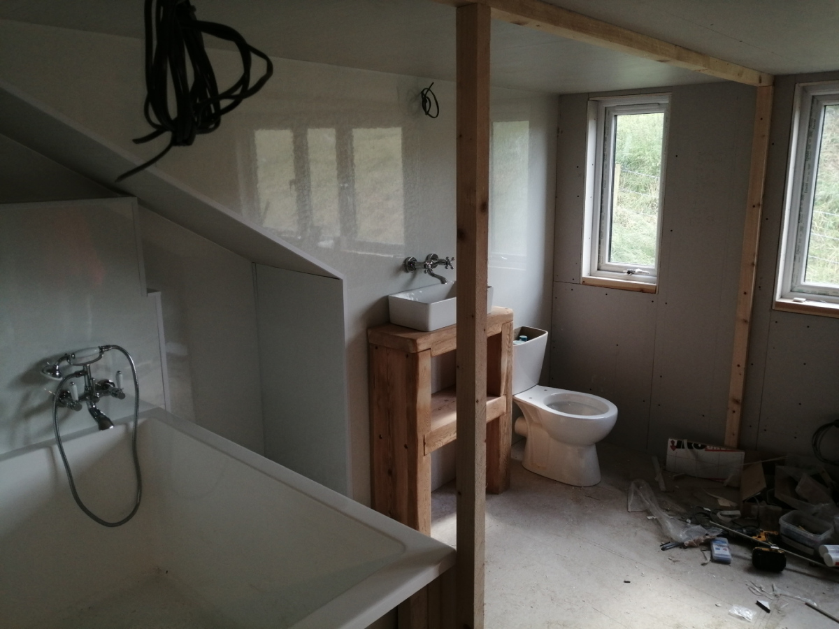 Side view of bathroom before stud wall and glass blocks are installed