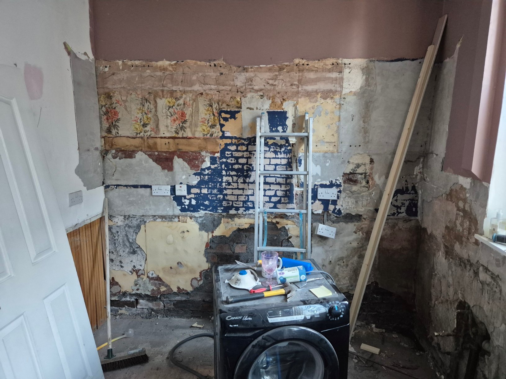 Old kitchen stripped out ready for new kitchen in this average sized kitchen