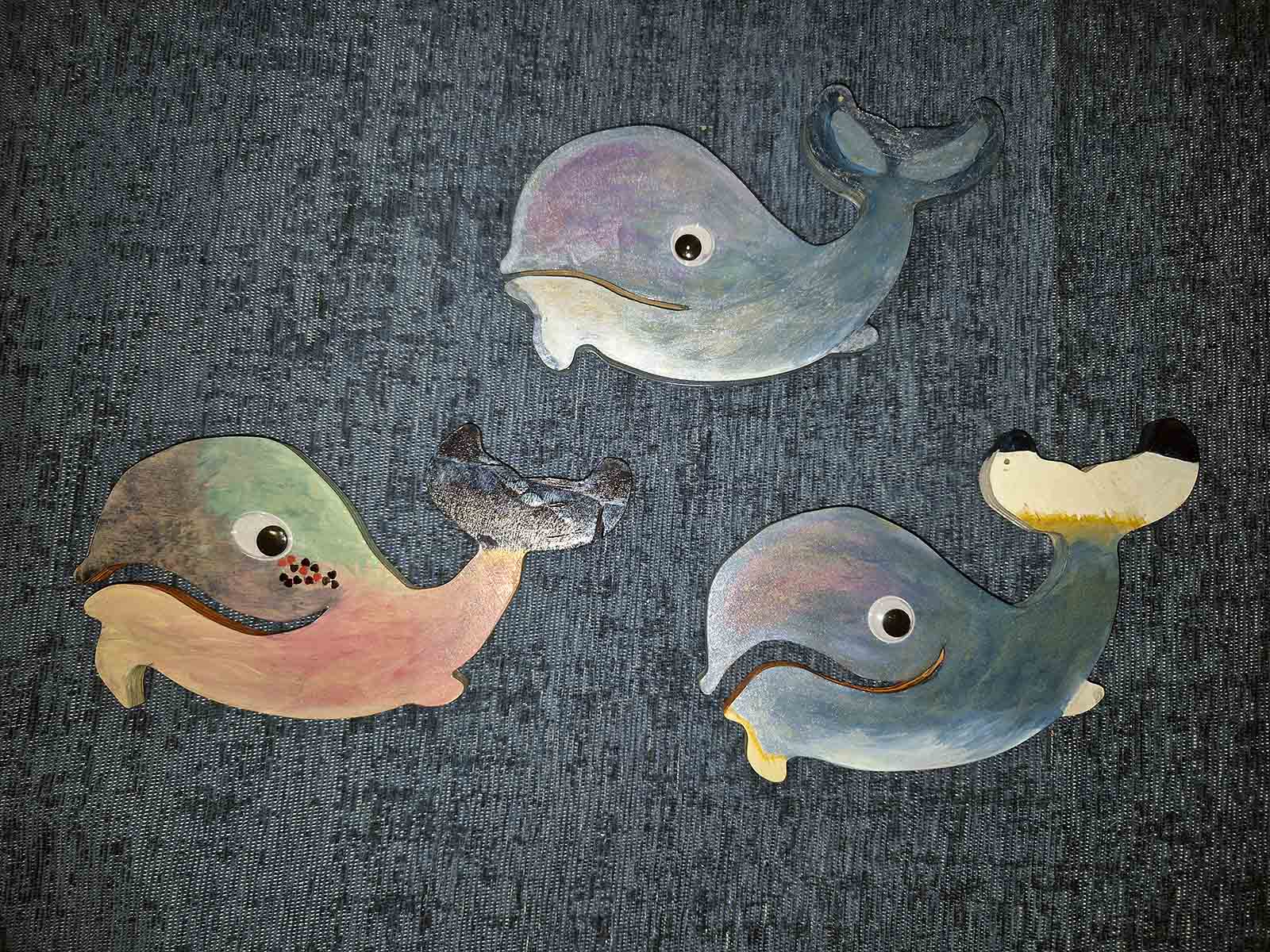 Three hand painted whales