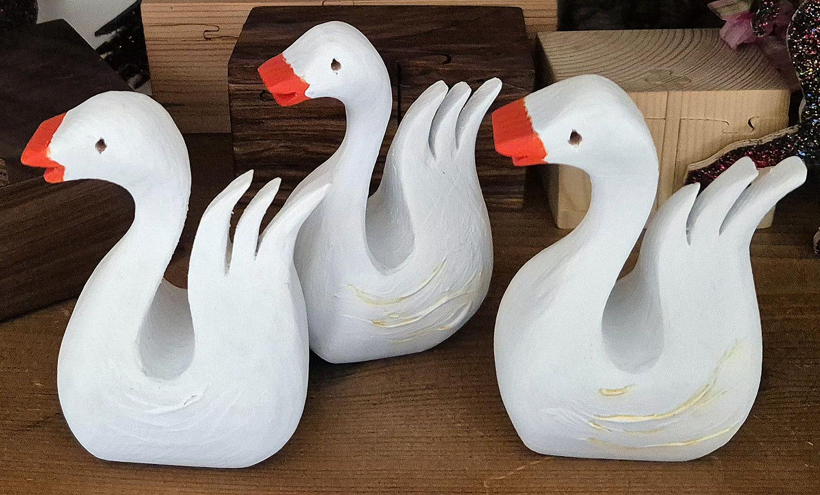 Three white ducks
